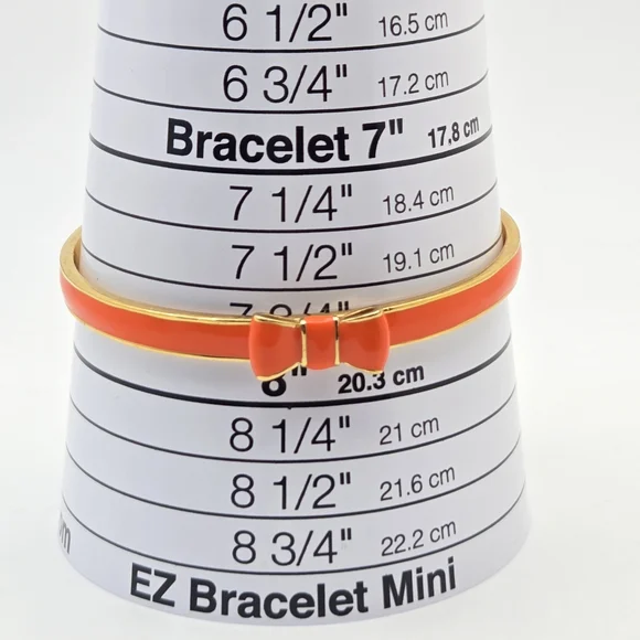 Kate Spade New York Skinny Mini Bow Enamel Bangle - Gold & Coral/Orange - Picture 3 of 14